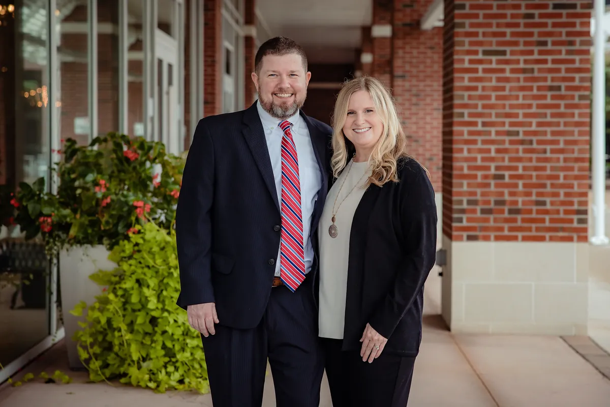 David and Beverly Anderson outside the firm in Wilmington, NC